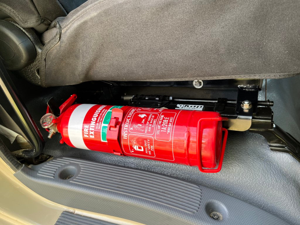 Isuzu NPS with Stratos Seats Fire Extinguisher Bracket