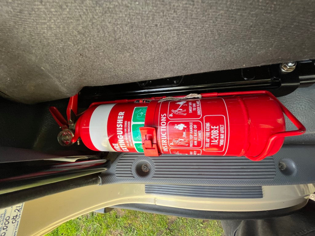 Isuzu NPS with Stratos Seats Fire Extinguisher Bracket