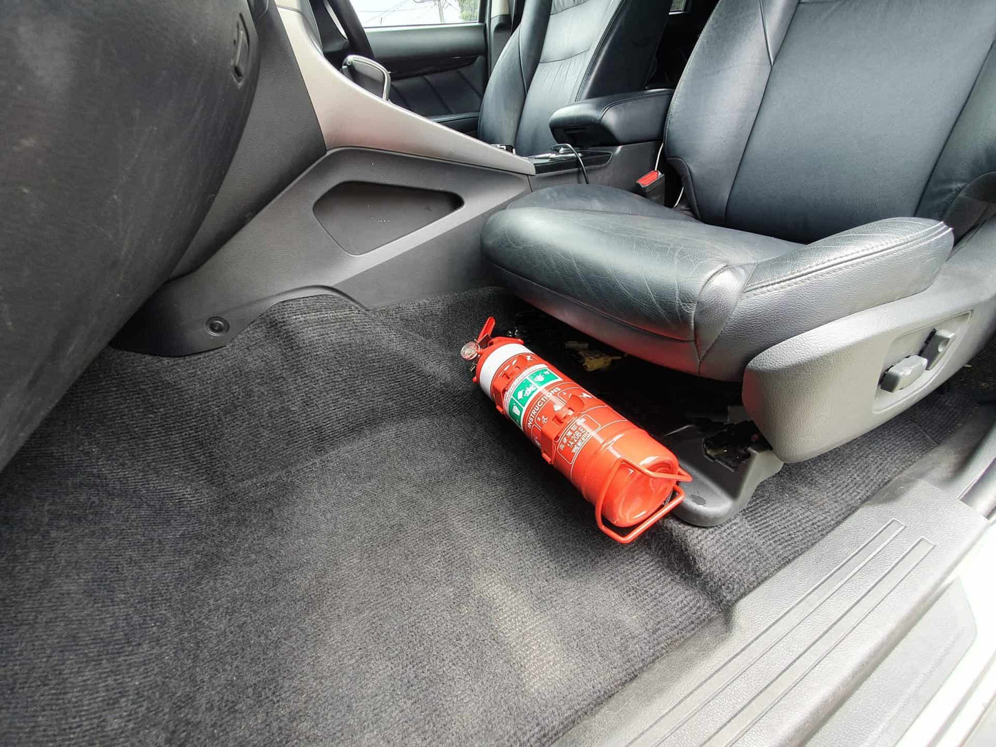 Mitsubishi Pajero (Sport) Fire Extinguisher Bracket